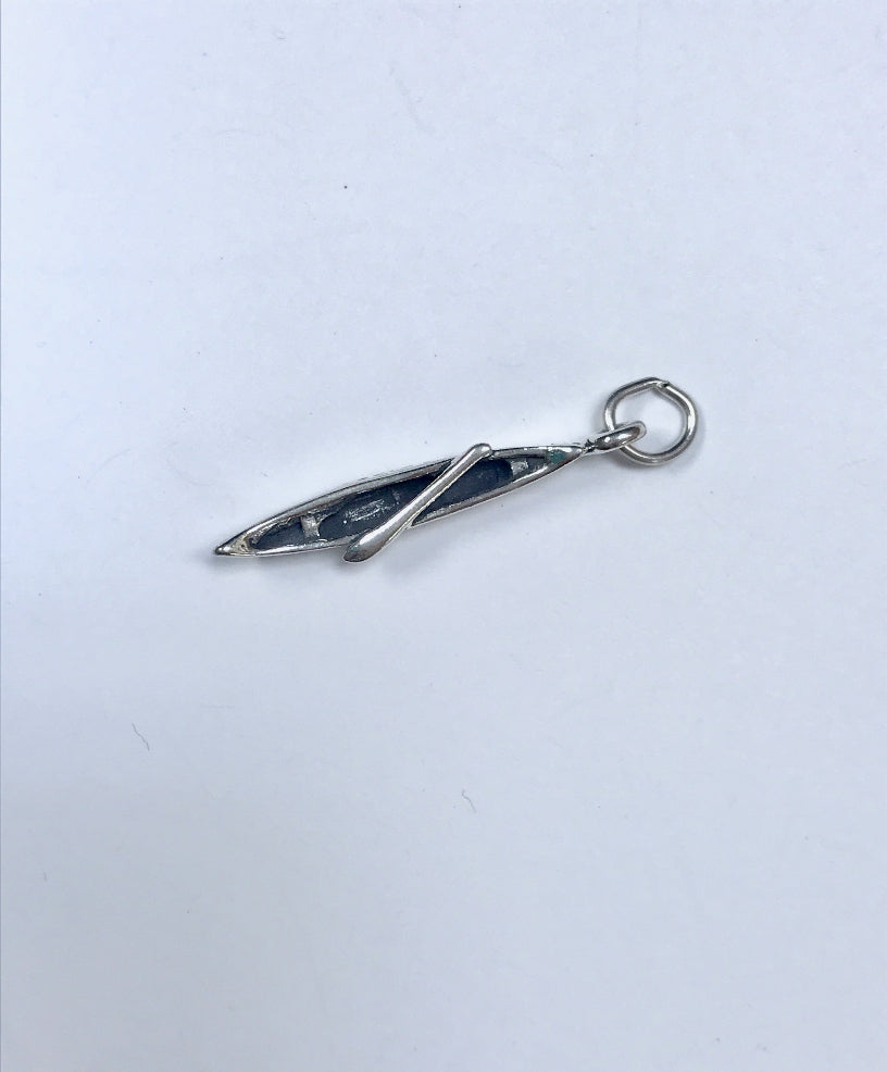 Pirogue Charm